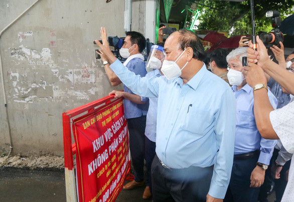 Chủ tịch nước Nguyễn Xuân Phúc: Thực hiện đồng bộ các biện pháp để bảo vệ tính mạng của người dân