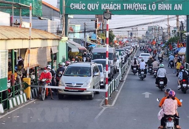 Người dân “nối đuôi” nhau về Thành phố Hồ Chí Minh sau kỳ nghỉ Tết Nguyên đán. (Ảnh: TTXVN phát)