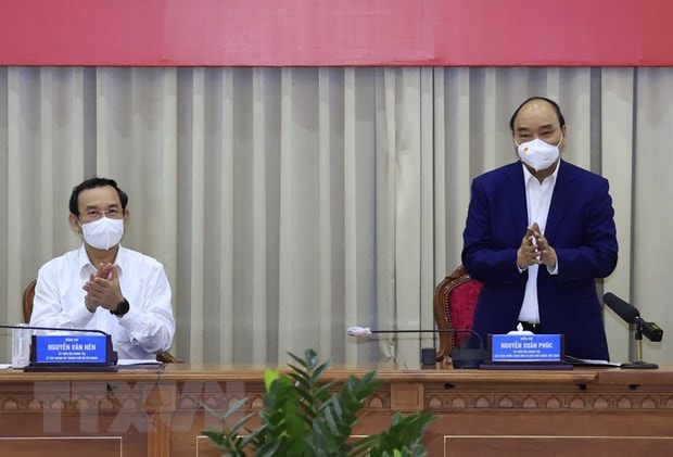 Chủ tịch nước Nguyễn Xuân Phúc chủ trì hội nghị. (Ảnh: Thống Nhất/TTXVN)