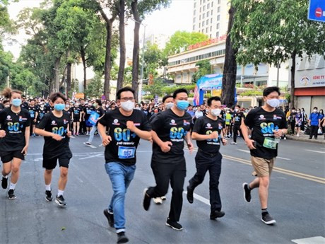 TP.HCM: Thanh niên tham gia chạy bộ hưởng ứng Giờ Trái Đất năm 2022