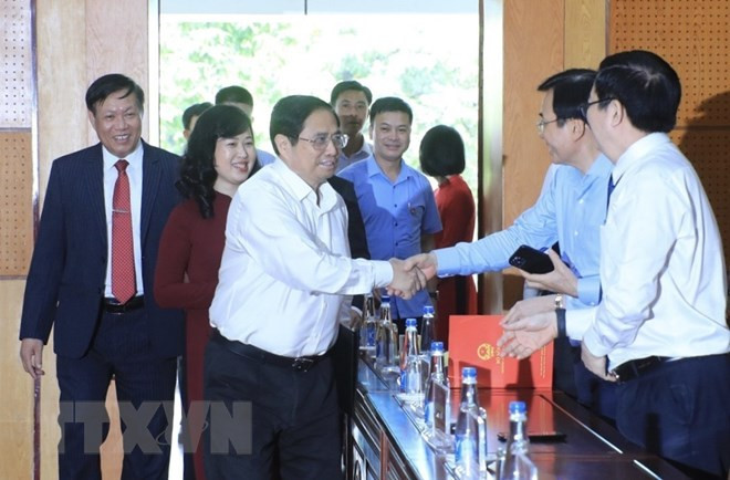 Thủ tướng Phạm Minh Chính đến dự Hội nghị công bố quyết định Bí thư Ban Cán sự Đảng và Quyền Bộ trưởng Bộ Y tế đối với bà Đào Hồng Lan, Ủy viên Trung ương Đảng, Bí thư Tỉnh ủy Bắc Ninh. (Ảnh: Lâm Khánh/TTXVN)