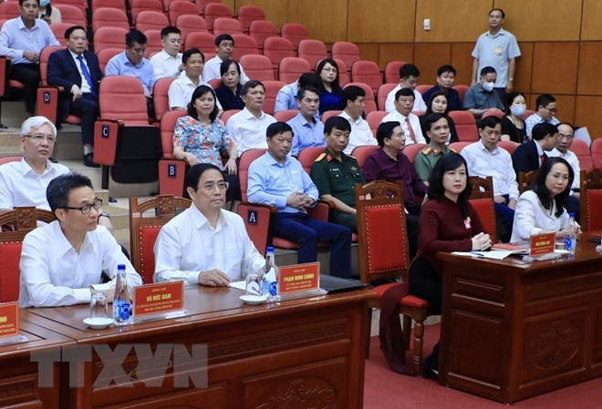 Thủ tướng Phạm Minh Chính và các đại biểu dự hội nghị công bố Quyết định Quyền Bộ trưởng Bộ Y tế. (Ảnh: Lâm Khánh/TTXVN)
